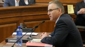Rep. Kevin Corlew testifies to the Missouri Senate Small Business, Insurance and Industry Committee.