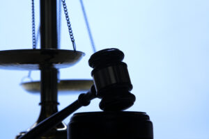 Silhouette of gavel and scales of Justice.