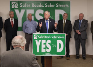 Governor Mike Parson speaking at Safer Roads Safer Streets meeting.