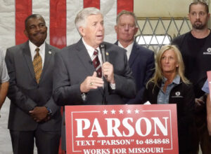 Governor Mike Parson speaking at event.