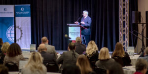 Gov. Mike Parson speaks at podium at Workforce2030 Conference.