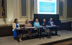 Panel of speakers addresses the crowd at Child Care Issue Forum in Kansas City